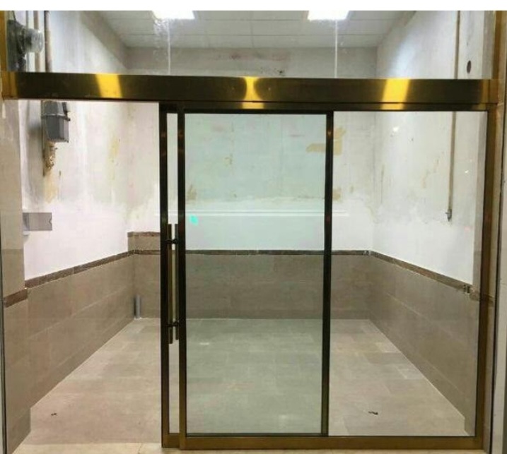 آقای کریمی _ نصب درب اتوماتیک شیشه ای